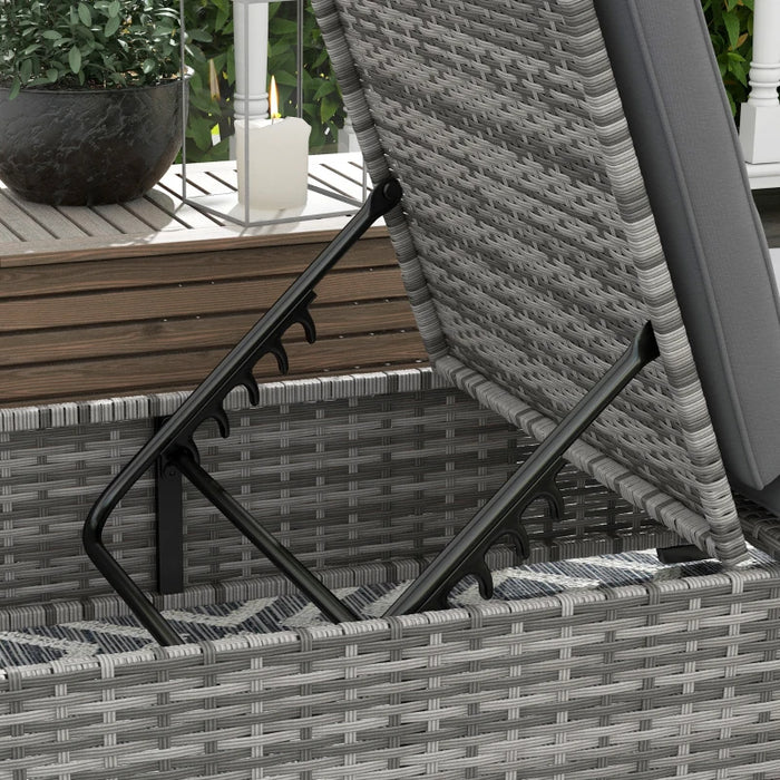 Image of a grey rattan reclining sun lounger