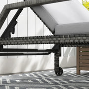 Image of a rattan sun lounger with grey cushion arms and wheels