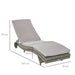 Image of an ergonomic curved rattan sun lounger with cushion and wheels 