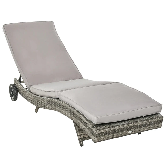 Image of an ergonomic curved rattan sun lounger with cushion and wheels 