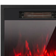 Close-up of the heater vent and flame window on the black electric fire