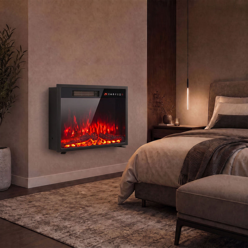 Wall mounted electric fire glowing beside a bed in a bedroom