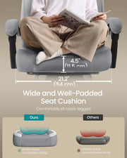 Person sitting cross-legged on the wide seat cushion