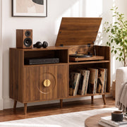 Walnut record player stand in a living room with turntable, speaker and headphones on top, lid open