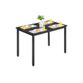Vasagle rectangular black dining table set for four with plates and glasses