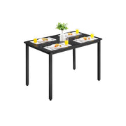 Vasagle rectangular black dining table set for four with plates and glasses