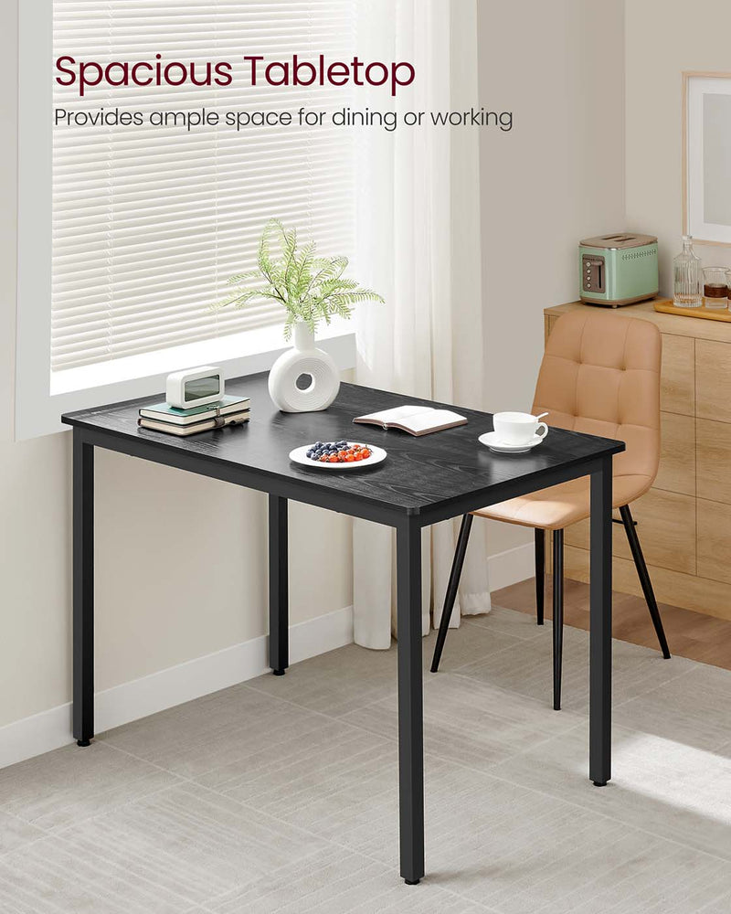 Close-up of the tabletop surface and black finish