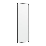 Songmics full-length mirror hanging over a bedroom door