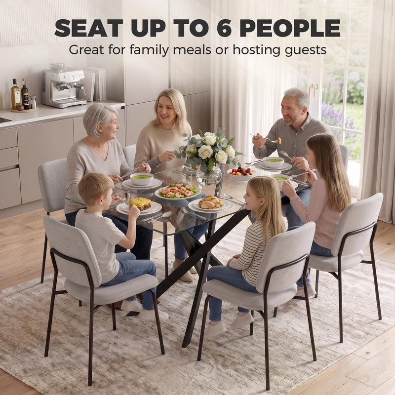 Family seated around the glass dining table, labelled seats up to 6 people