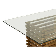 Close-up of the matte gold stainless steel finish on the dining table base