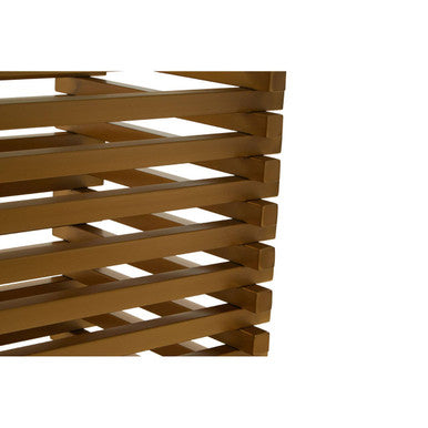Detail of the matte gold foot where the dining table base meets the floor