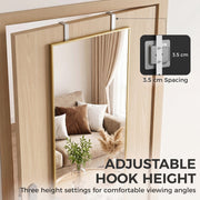 Hooks over a wooden door with 3.5 cm spacing for comfortable viewing angles
