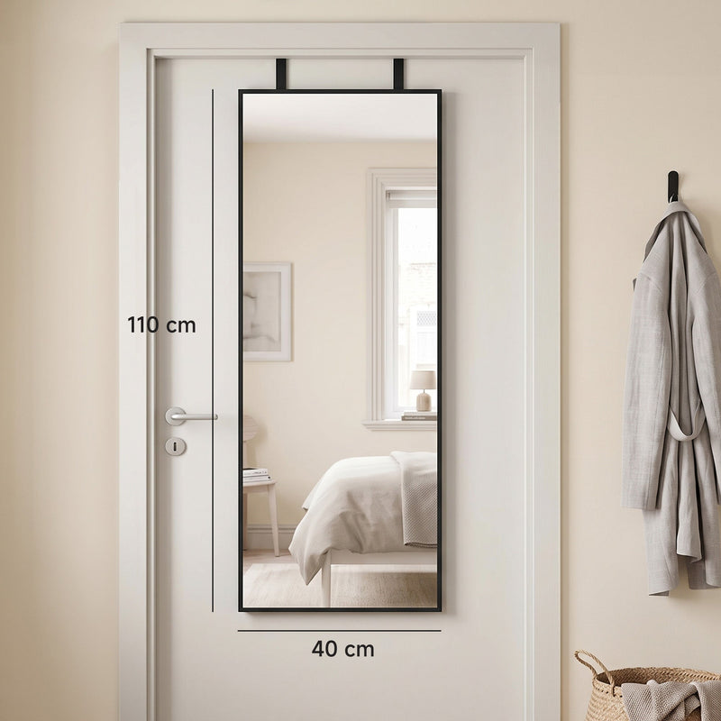 Mirror hung on a bedroom door with 110 cm height and 40 cm width marked