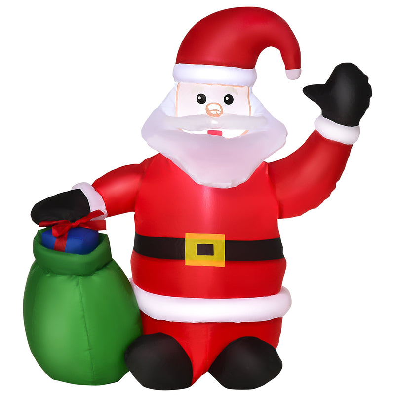 Red inflatable Santa waving with a green gift sack, white studio shot from a slight angle