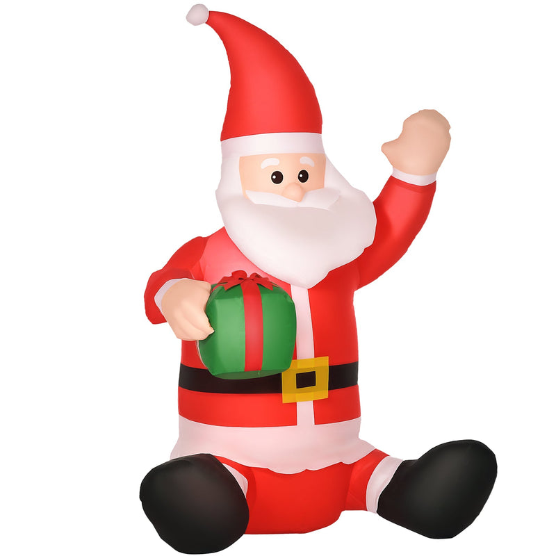 Sitting inflatable Santa holding a gift, white studio shot from a slight angle