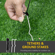 Ground stake and tether rope being fixed into grass, with a rope coil and stakes shown