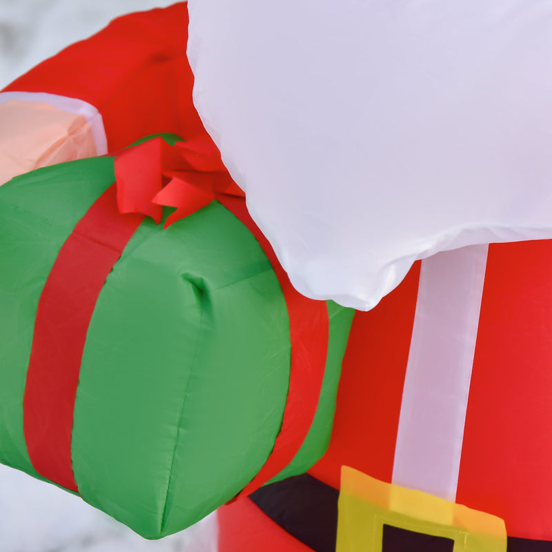 Close-up of the green and red gift box held on the Santa lap
