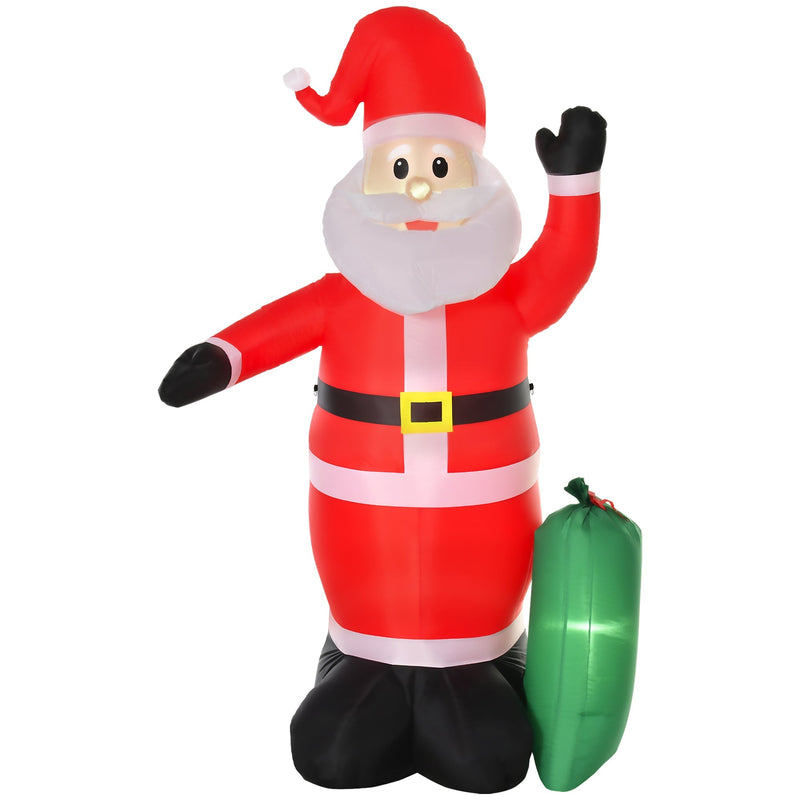 Red inflatable Santa waving with a green gift bag, studio shot from a slight angle