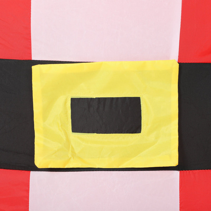 Close-up of the Santa's black belt with yellow buckle on red and white suit fabric