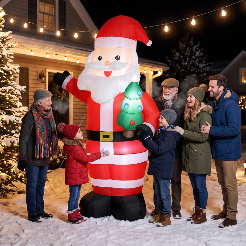 Family looking up at the giant lit Santa outside a house at night