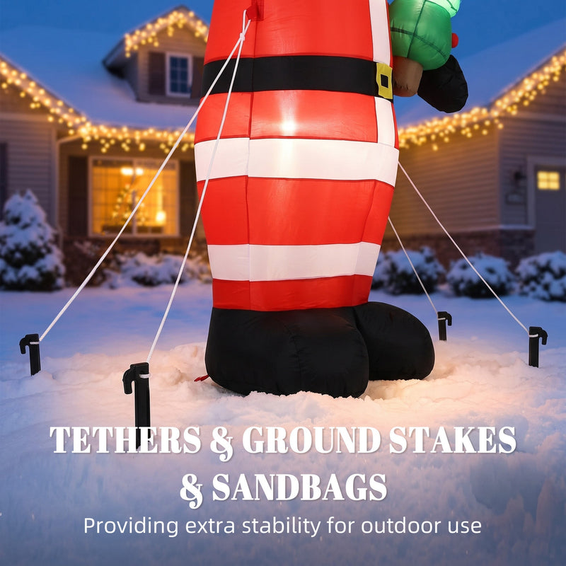 Santa anchored with tether ropes and ground stakes in front of a lit house