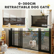 Black retractable dog gate fitted across a hallway, a stairway and a patio doorway