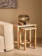 Smoked brown glass lamp on a console with decor