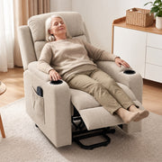 Woman resting in the beige riser recliner with the footrest raised