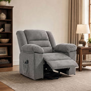 Recliner chair with footrest raised in a living room beside a bookcase