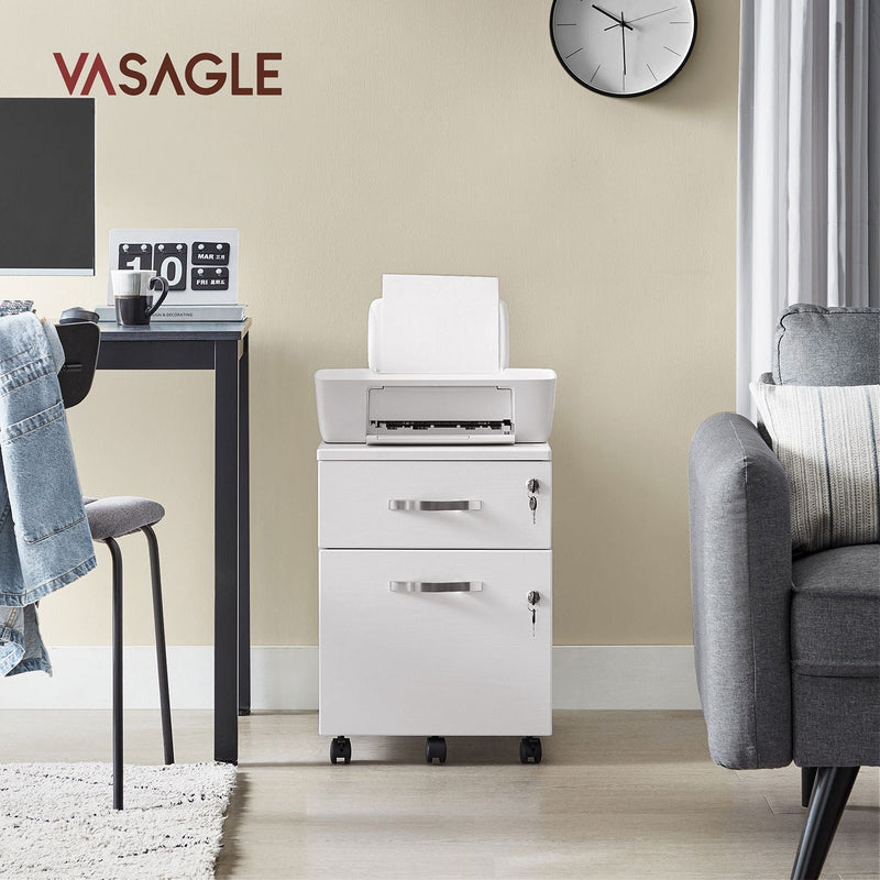 White file cabinet holding a printer in a home office beside a black desk and grey sofa