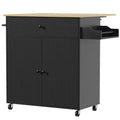 Black rolling kitchen island with drop-leaf top, drawer and cabinet, studio shot