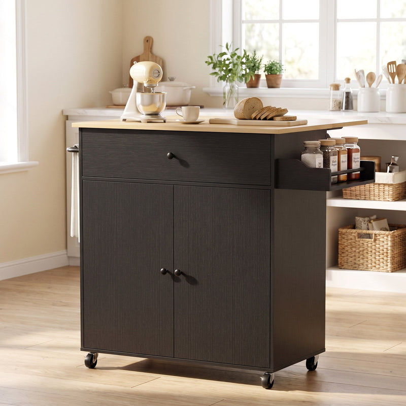 Black kitchen island in a kitchen with a stand mixer and spice jars on the spice rack