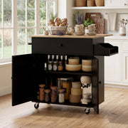 Black kitchen island with cabinet open showing jars, bowls and a stand mixer stored inside