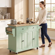 Woman standing beside the kitchen island in a sunlit kitchen with breakfast items on top