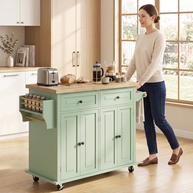 Woman standing beside the kitchen island in a sunlit kitchen with breakfast items on top