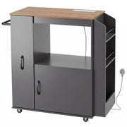 Grey Homcom kitchen trolley with closed cabinet doors and power socket, studio shot