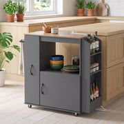 Grey kitchen trolley styled in a wooden kitchen with bowls and plates on the shelf