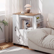 White kitchen trolley used as a living room side table next to a sofa