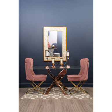 Rose gold rectangular dining table, studio front angle