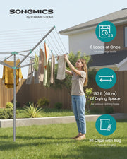 Woman hanging washing on the rotary line in a garden, with 60 m and 6-load callouts