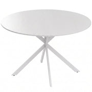 White round dining table with X-shaped white steel legs on a plain background