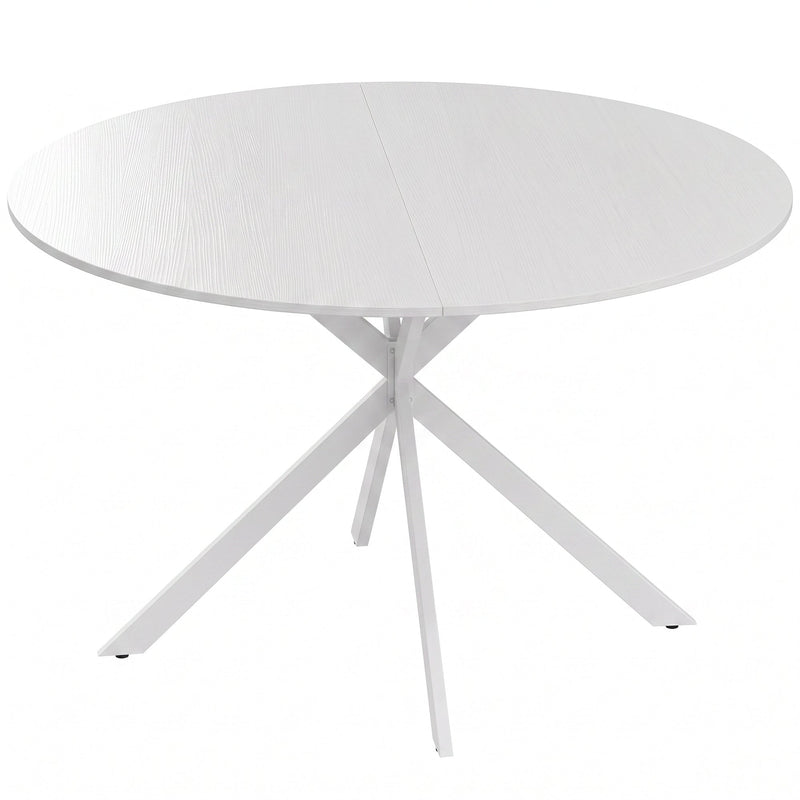 White round dining table with X-shaped white steel legs on a plain background
