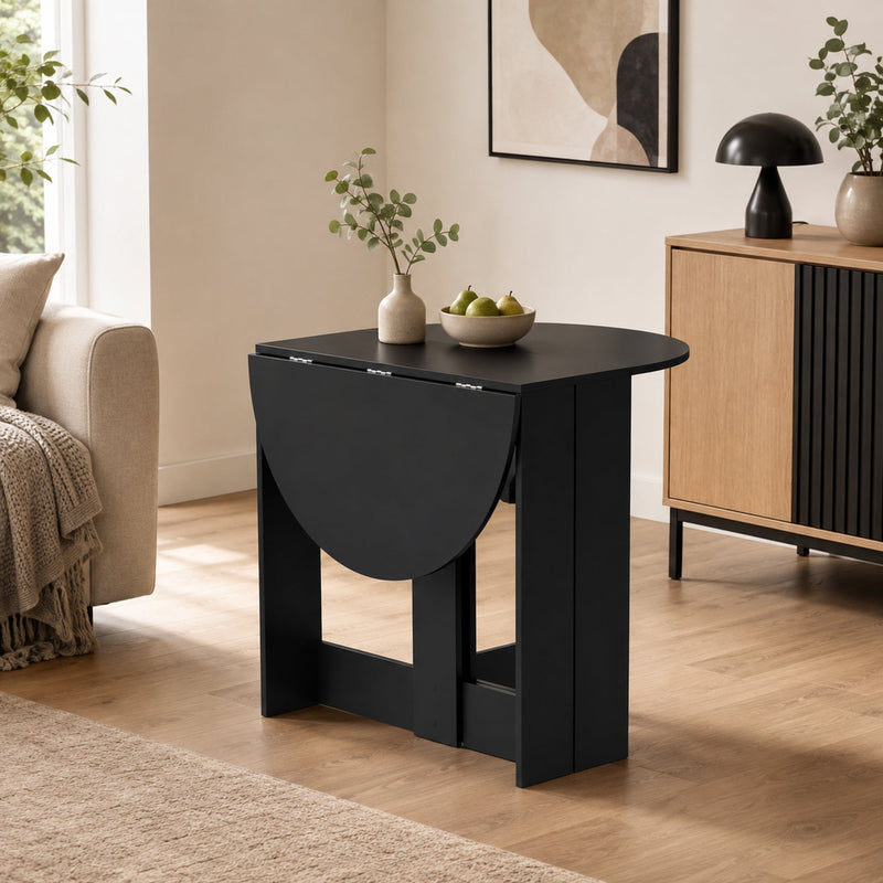 Close-up of the black particleboard tabletop finish