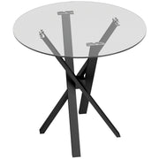 Round clear glass dining table on black criss-cross steel legs, white background