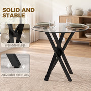 Black cross steel legs and adjustable foot pad detail on the glass dining table
