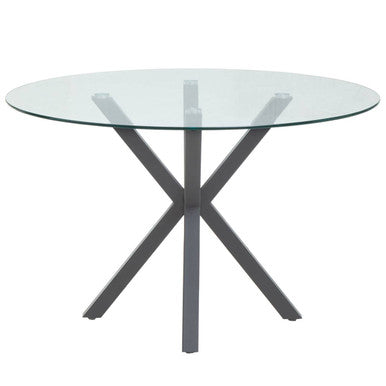 Round glass dining table with grey metal starburst legs, studio shot