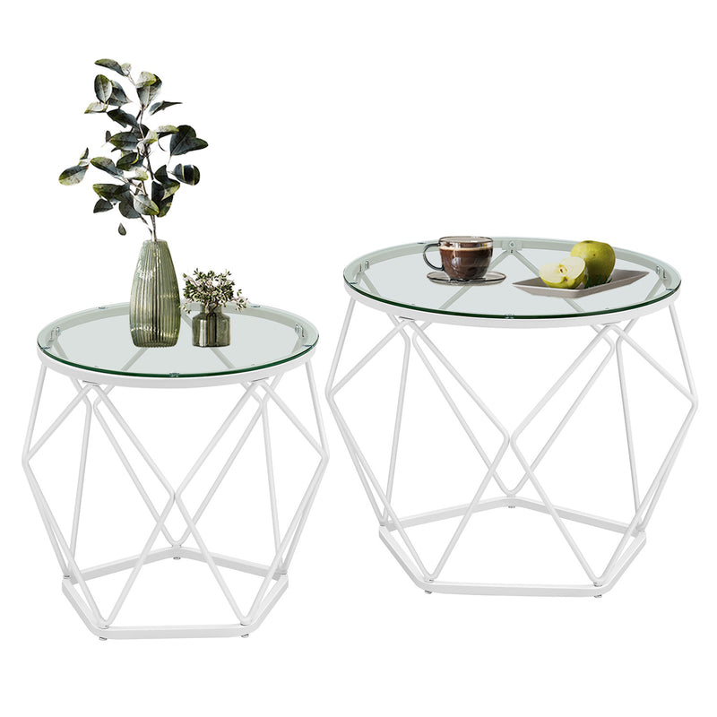 Set of 2 round glass coffee tables with white geometric steel bases, large and small side by side