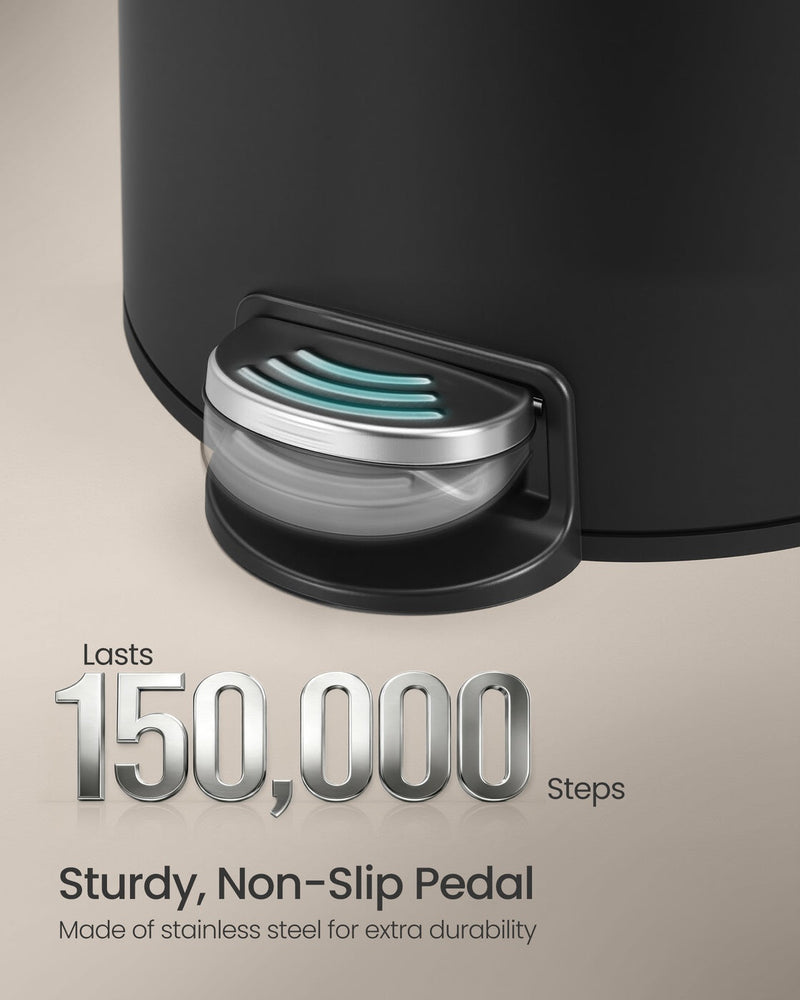 Close-up of the black bin's stainless steel foot pedal, rated for 150,000 presses