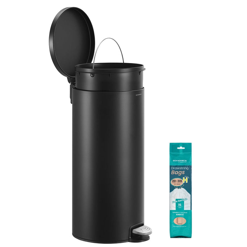Matte black 30L round pedal bin with the lid open, beside a pack of liner bags