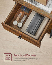 Open drawer holding a watch, a wallet and a glasses case